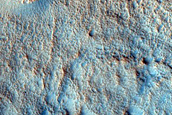 Layered Deposit in Small Northern Mid-Latitude Crater
