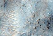 Channel Cutting through Crater in Hesperia Planum
