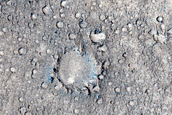 Pasted-on Material on Crater Ejecta

