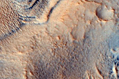 Layered Feature in Crater in Northern Plains
