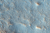 Tilted Layers in Crater Near Renaudot Crater
