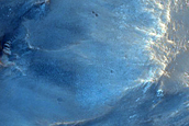 Unusual Circular Depressions around Naar Crater