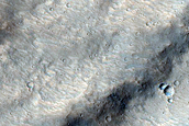 Possible Clay-Bearing Layers Exposed in Shalbatana Vallis Scarp
