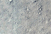 Layered Materials in Crater in Arabia Terra