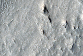 Inverted Channel Deep within Crater in Aeolis Dorsa