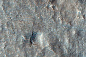 Dipping Layers in Crater Near Mamers Valles