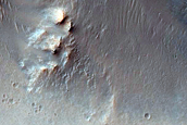 Butte and Mesa-Forming Materials in Southeast Wislicenus Crater