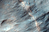 Spectrally Distinct Crater Ejecta in Tyrrhena Terra 