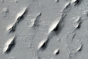 Intracrater Pits in Northern Arabia Terra