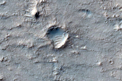 Small Sinuous Light-Toned Feature on Ridged Plain