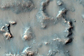 Clay-Bearing Landslide and Outcrop in Degraded Crater