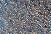 Dipping Layers Against Mound in Northern Mid-Latitudes