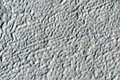 Layered Features in Arabia Terra