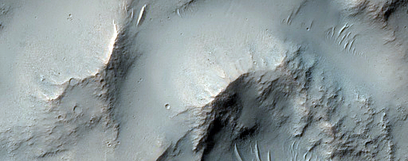 Possible Pyroxene-Rich Material in Crater Ejecta