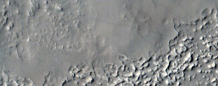 Sinuous Inverted Channel in Large Basin in East Arabia Terra