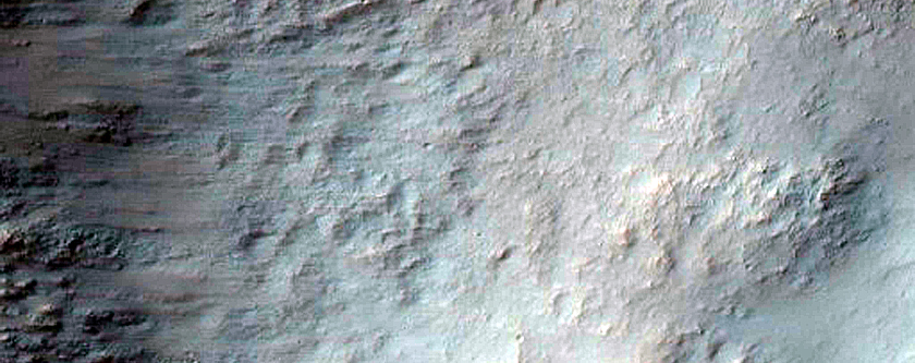 Crater Wall with Flow Lineae in Terrain North of Morava Valles