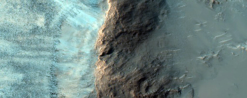 Olivine-Rich Bedrock Exposed in Crater Wall in Tyrrhena Terra