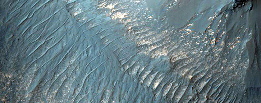 Contacts between Light-Toned and Dark-Toned Rock in Juventae Chasma