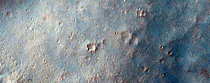 Wrinkle Ridge and Channel Intersection Along Huygens Crater Rim