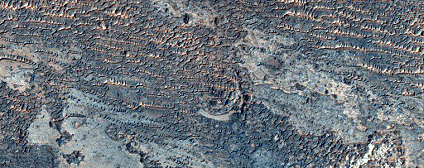 Material Exposed in Plains South of Louros Valles