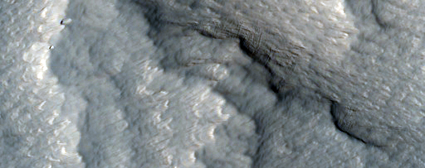 Layers in Depressions on Flank of Ascraeus Mons