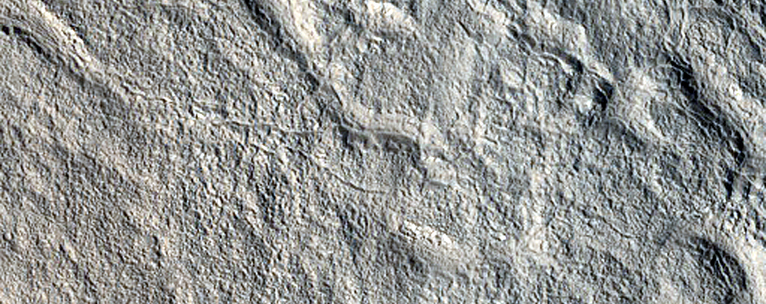 3-Kilometer Crater on Potential Ice-Rich Polygon Center in Utopia Planitia