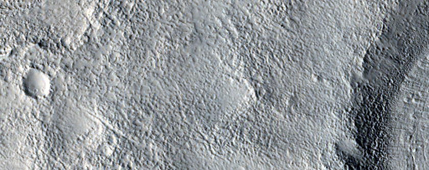 Dipping Layers in Crater and Depression in Deuteronilus Mensae