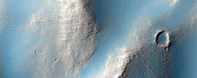 Valley Cutting Old Crater Rim near Ausonia Montes