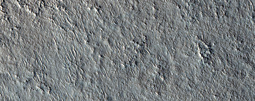 Layered Feature in Crater in Northern Mid-Latitudes