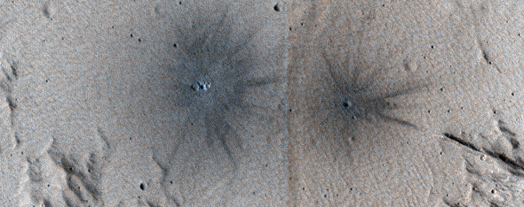 A Criss-Cross Landscape with Fresh Craters