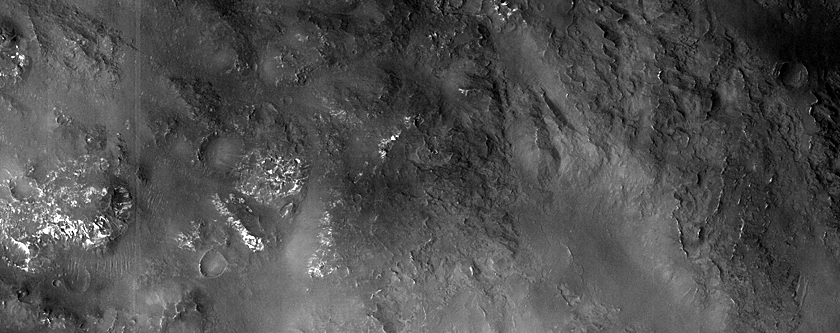 Possible Melt Bearing Deposits around Sibiti Crater