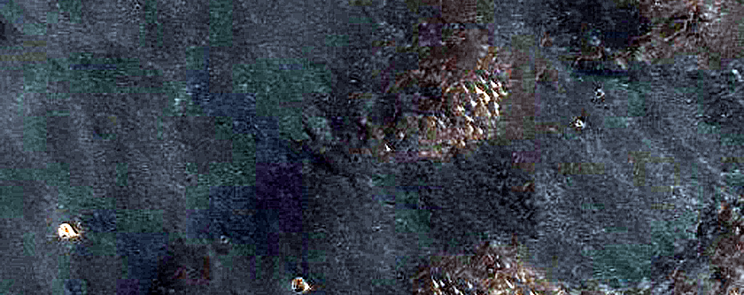 Dark Materials on Noctis Labyrinthus Plateau