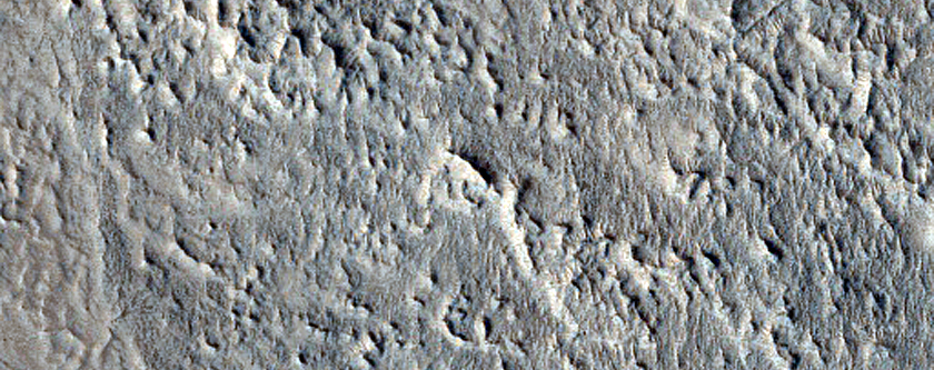 Layered Feature in Crater in Nilosyrtis Mensae