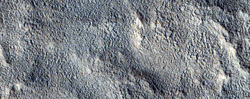Channel near Crater in Northern Mid-Latitudes