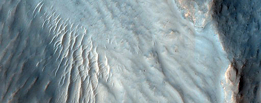 Flow Features Associated with Well-Preserved 10-Kilometer Crater
