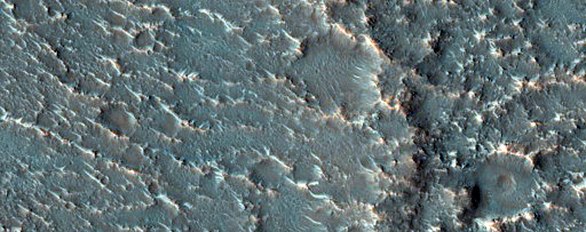 Valleys Cutting through Crater Rim in Tyrrhena Terra