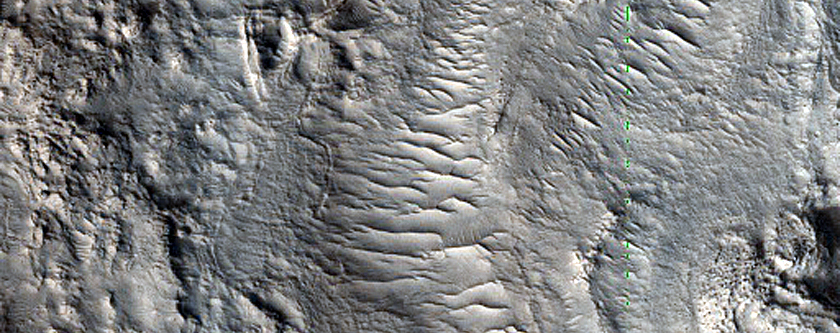 Ridges and Troughs in Crater Ejecta inside Cerulli Crater