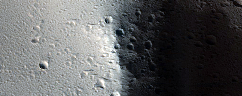 Rahe Crater near Ceraunius Tholus