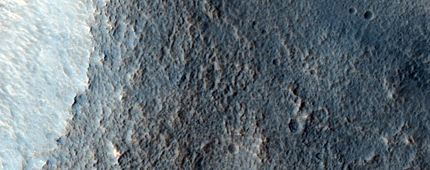 Dipping Layers in Crater near Reull Vallis