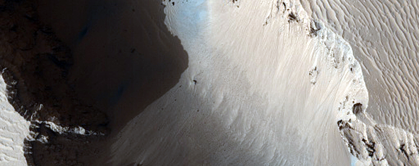 Cerberus Fossae Slopes with Boulder Tracks