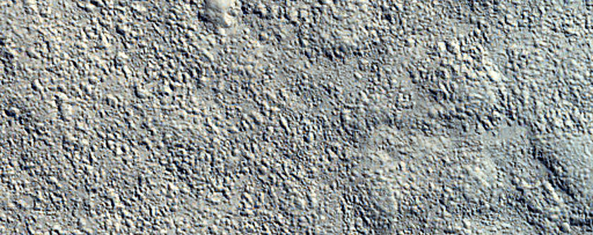 Dipping Layers in Crater South of Semeykin Crater