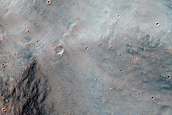 Potential Exposed Bedrock on Crater Floor in Terra Cimmeria