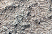 Rocky Deposits on Floor of Briault Crater