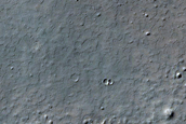 Crater with Smooth-Floored Central Pit