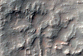 Possible Exposed Layered Ejecta North of Kontum Crater