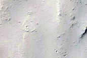 Possible Equatorial Ice-Rich Material in Schiaparelli Crater