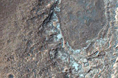 Depression among Chaos or Slump Blocks in Western Juventae Chasma