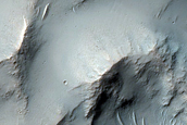 Possible Pyroxene-Rich Material in Crater Ejecta
