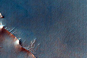 Light-Toned Features on Dark-Toned Mound in Juventae Chasma