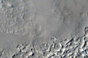 Sinuous Inverted Channel in Large Basin in East Arabia Terra